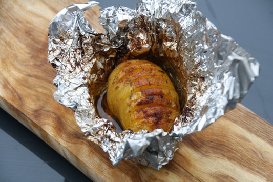 Op de BBQ gepofte aardappel